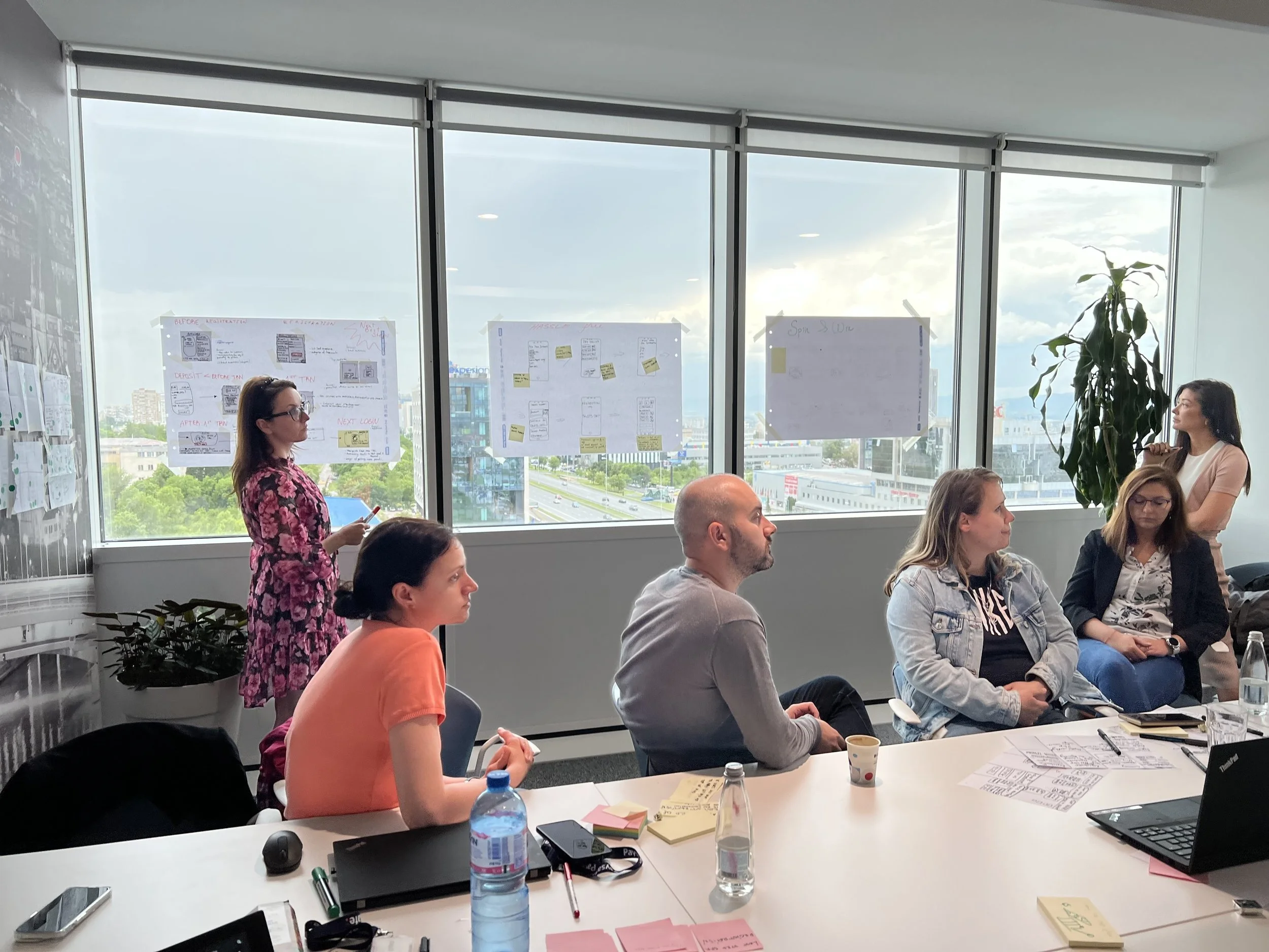 The UX Team debating ideas during a real design sprint